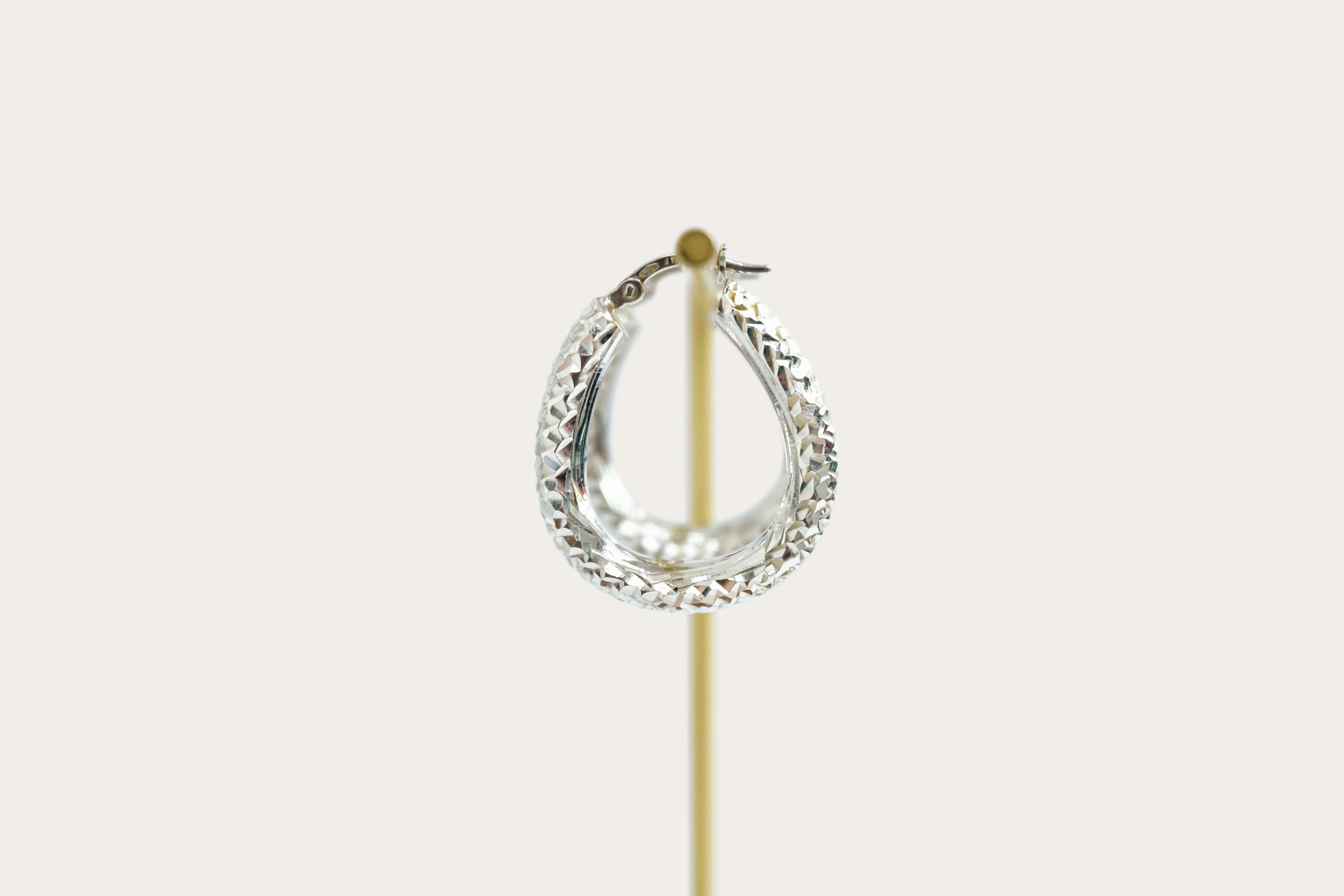Diamond-cut Oval Hoop Earrings