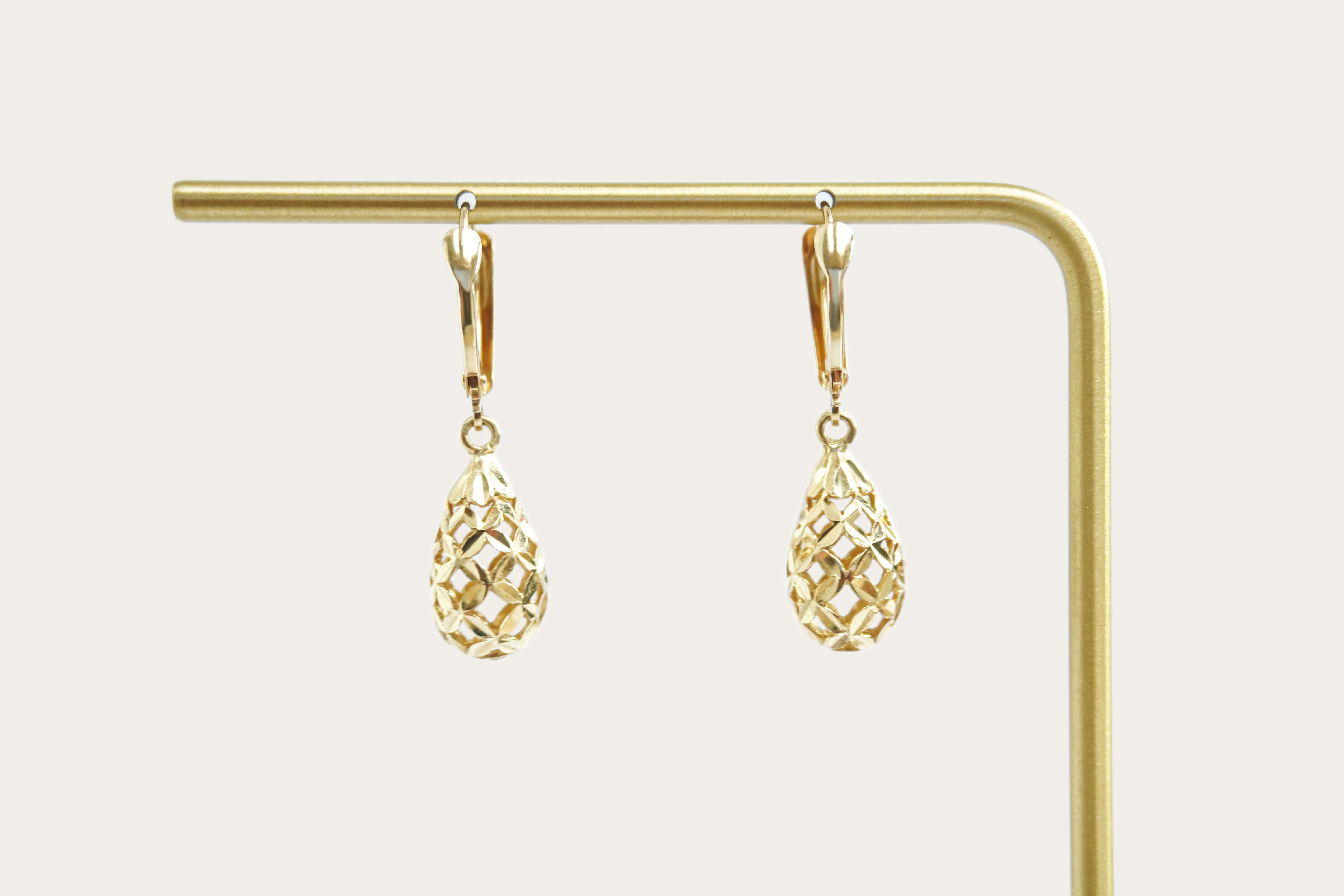 Pear Shaped Hollow Drop Gold Earrings